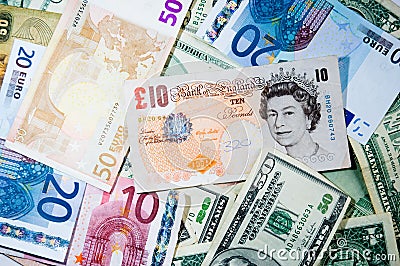 A jumble of currency Editorial Stock Photo