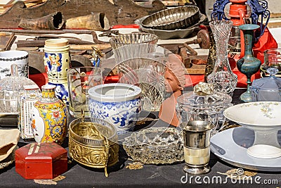 Jumble of knick-knack and trinkets on sale at street market, Ch Stock Photo