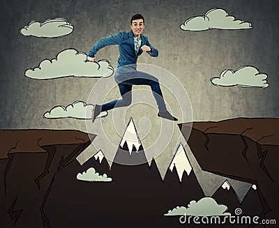 Jump over chasm Stock Photo