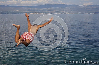 Jump in the sea Stock Photo