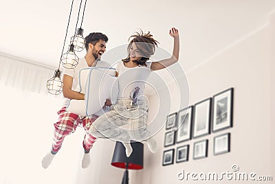 Jumping on bed Stock Photo