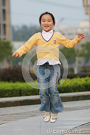 Jumping girl Stock Photo