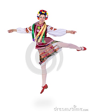 Jumping girl in polish national traditional costume, full length portrait against isolated white background Stock Photo