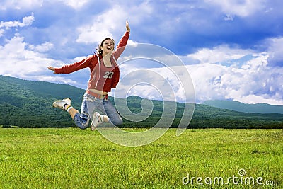 Jumping laughter girl Stock Photo