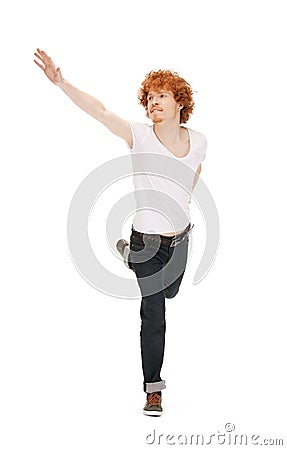 Jumping man in white shirt Stock Photo