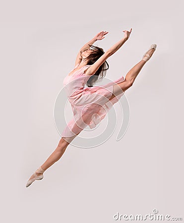 Jumping professional ballet girl dancer Stock Photo