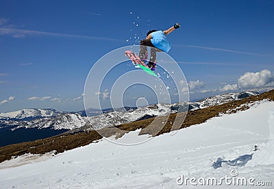 Jumping snowboarder Editorial Stock Photo