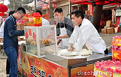 Jun Le, China: Chinese Pizza Vendors Editorial Stock Photo