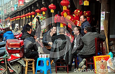 Jun Le, China: Men Playing Cards Editorial Stock Photo