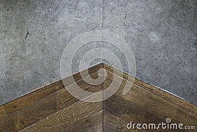 The junction of natural stone and wooden floor High-quality close-up photo Stock Photo