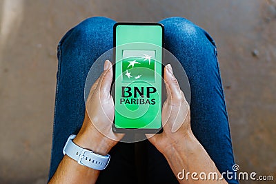June 23, 2023, Brazil. In this photo illustration, the BNP Paribas logo is displayed on a smartphone mobile screen Cartoon Illustration