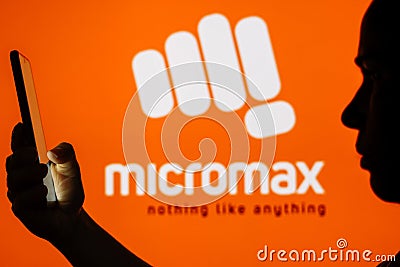 June 13, 2023, Brazil. Micromax Informatics logo is seen in the background of a silhouetted woman Cartoon Illustration