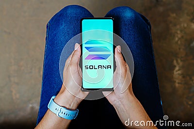 June 20, 2023, Brazil. In this photo illustration, the Solana logo is displayed on a smartphone screen Cartoon Illustration