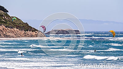 June 6, 2019 Davenport / CA / USA - People kite surfing in the Pacific Ocean, near Santa Cruz, on a sunny and warm day Editorial Stock Photo