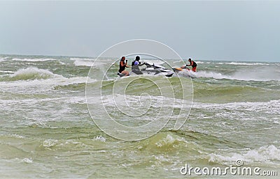 Jets skiers playing during tropical storm hurricane Editorial Stock Photo