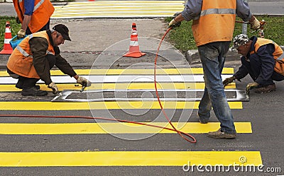 June 12, 2020 Novocheboksarsk Russia, road workers make a new crossing Editorial Stock Photo