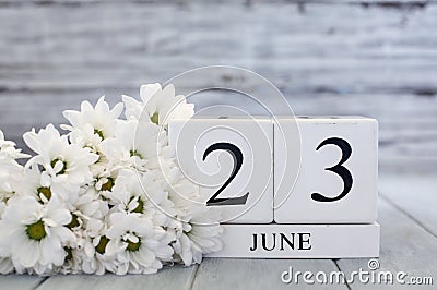 June 23th Calendar Blocks with White Daisies Stock Photo