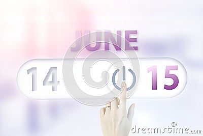 June 15th. Day 15 of month, Calendar date.Hand finger switches pointing calendar date on sunlight office background. Summer month Stock Photo