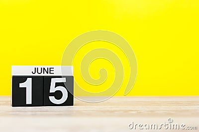 June 15th. Day 15 of month, calendar on yellow background. Summer day. Empty space for text. Global Wind Day. Tax DAY Stock Photo