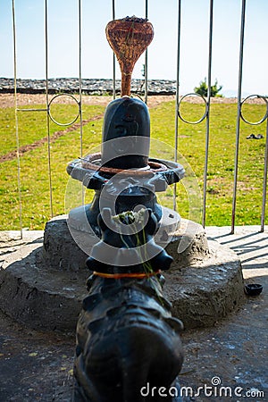 June 28th 2023,Nagthat, Uttarakhand, India. Shiva Linga, a sacred symbol of Lord Shiva, accompanied by a Nandi Ox, representing Stock Photo