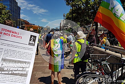 Mouvement of Yellow vests support Pride March. French anti-homophobia leaflet Editorial Stock Photo