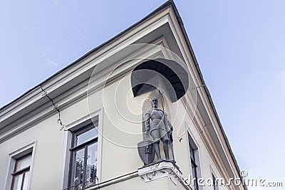 June 13, 2023 Vilnius, Lithuania. Statue of the city guard on the wall of the Umiastovsky Palace in Vilnius Editorial Stock Photo