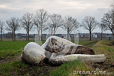 Junk dumped in rural area near city Stock Photo