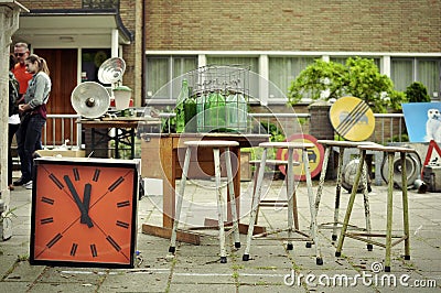 Junk for sale at the King's day market. Editorial Stock Photo