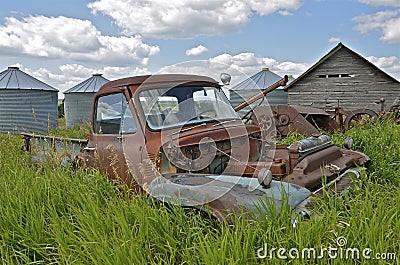 Junked truck in abandoned farmstead Stock Photo