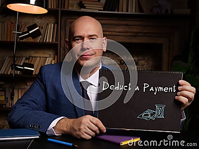 Juridical concept meaning Deduct a Payment with phrase on the page Stock Photo
