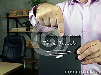 Juridical concept meaning Tech Trends with sign on the page Stock Photo