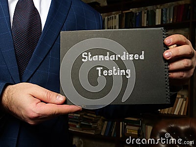 Juridical concept about Standardized Testing with inscription on the piece of paper Stock Photo