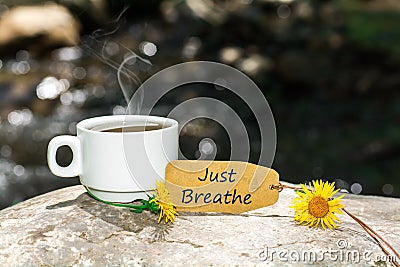 Just breathe text with coffee cup Stock Photo