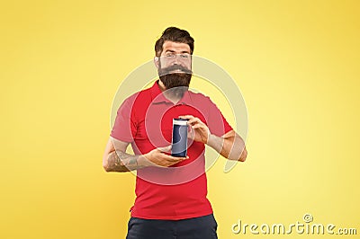 Just fabulous hair. Shampoo for hair type. Make hair stronger. Man cheerful handsome bearded hipster hold bottle shampoo Stock Photo