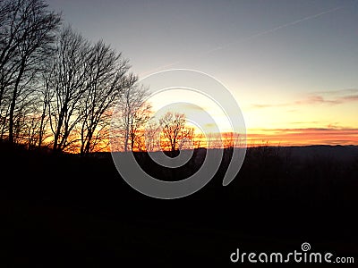 A magnificent sunset on the descent to the valley. Stock Photo