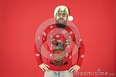 Just look at that. unhappy santa ready to celebrate xmas. its time for christmas. man reindeer on knitted sweater Stock Photo