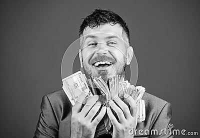 Just making money. businessman after great deal. Finance and commerce. happy bearded man has a lot of money. Business Stock Photo