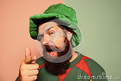 Just perfect. St Patricks day. Hipster with beard wearing green party costume pointing. Cheerful man celebrate holiday Stock Photo