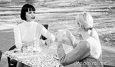 Just relaxing. bisiness lunch. summer fashion beauty. happy friends girls meet in cafe. gossip concept. happy lunch Stock Photo