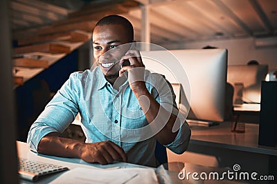 Just thought Id give you an update... handsome young male designer making a phonecall while working in the office. Stock Photo