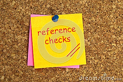 Reference checks postit on cork Stock Photo