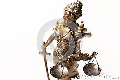 Justice blindfolded lady holding scales and sword statue Stock Photo