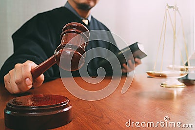 justice and law concept.Male judge in a courtroom with the gavel Stock Photo