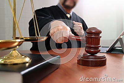 justice and law concept.Male judge in a courtroom with the gavel Stock Photo