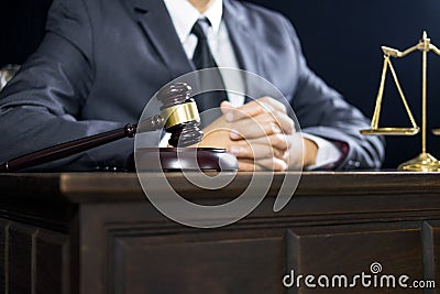 Justice and law concept.Male judge in a courtroom working on wood table with documents., attorney court judge justice gavel legal Stock Photo
