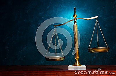 Justice scale on blue background Stock Photo