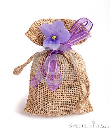 Jute sack with saintpaulia flower Stock Photo