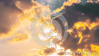 4K Sunset Cloudy Sky With Fluffy Clouds. Sunset Sky Natural Background. Sunrays, sunray, ray, Dramatic Sky. Sunset Time Stock Photo