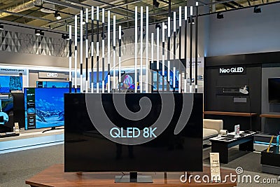 8K TV in modern electronics store. Samsung QLED 8K TV in a shop window. Minsk, Belarus - March 17, 2024 Editorial Stock Photo