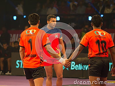 Kabaddi Raider and Defenders Editorial Stock Photo